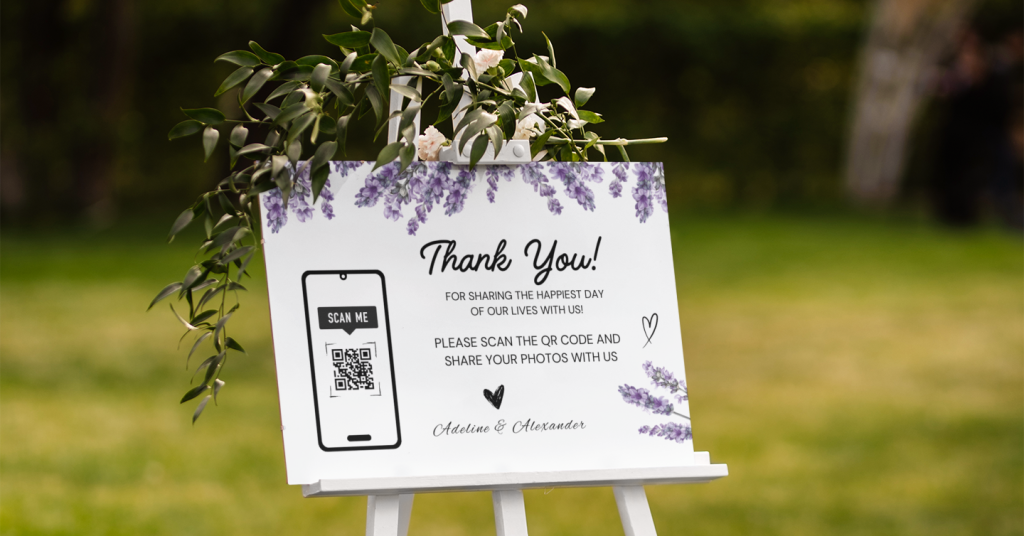 Entrance sign with wedding photo QR code and upload instructions